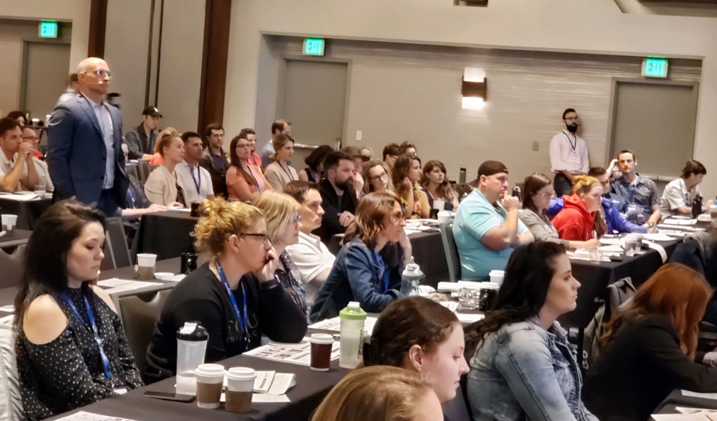 Attendees in session at a past Remarkable Practice event